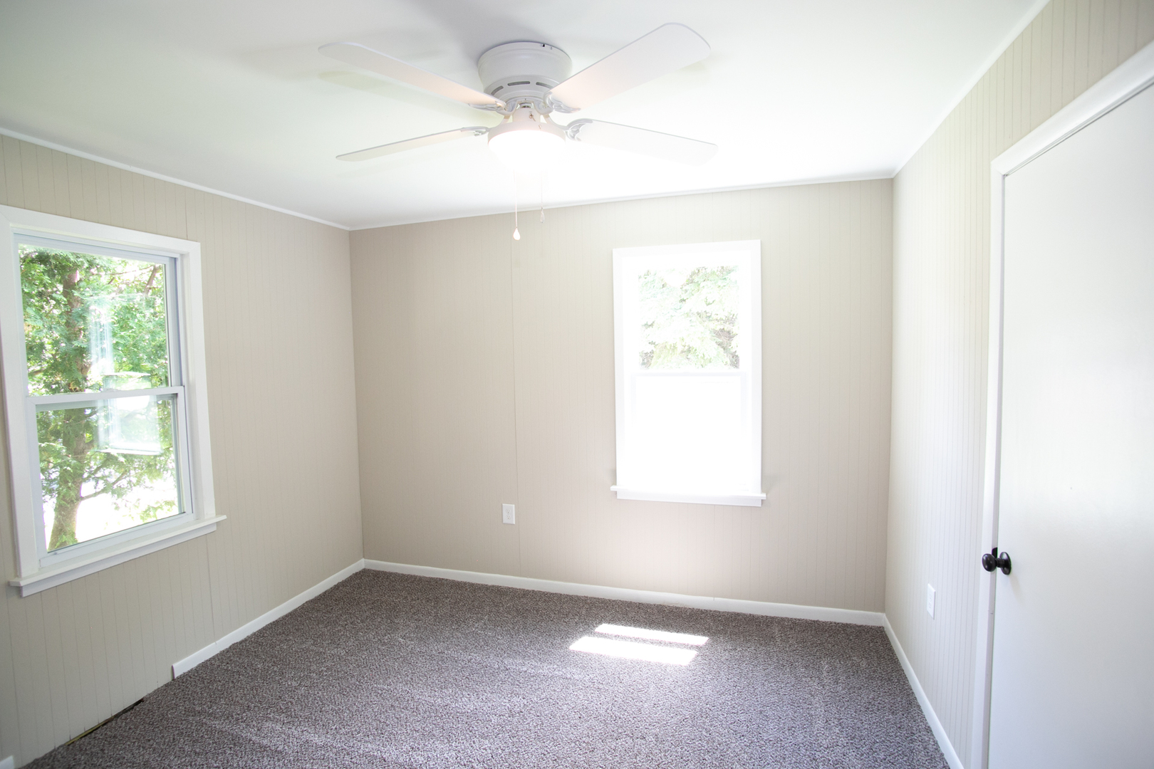 6000 Birmingham Street Chicago Ridge, IL 60415 - Photo 14 of 23 an empty room with a window and a fan