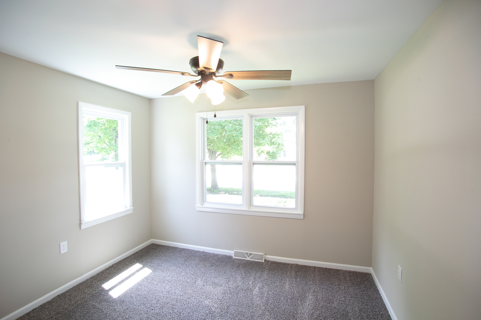 6000 Birmingham Street Chicago Ridge, IL 60415 - Photo 16 of 23 an empty room with a window and a fan