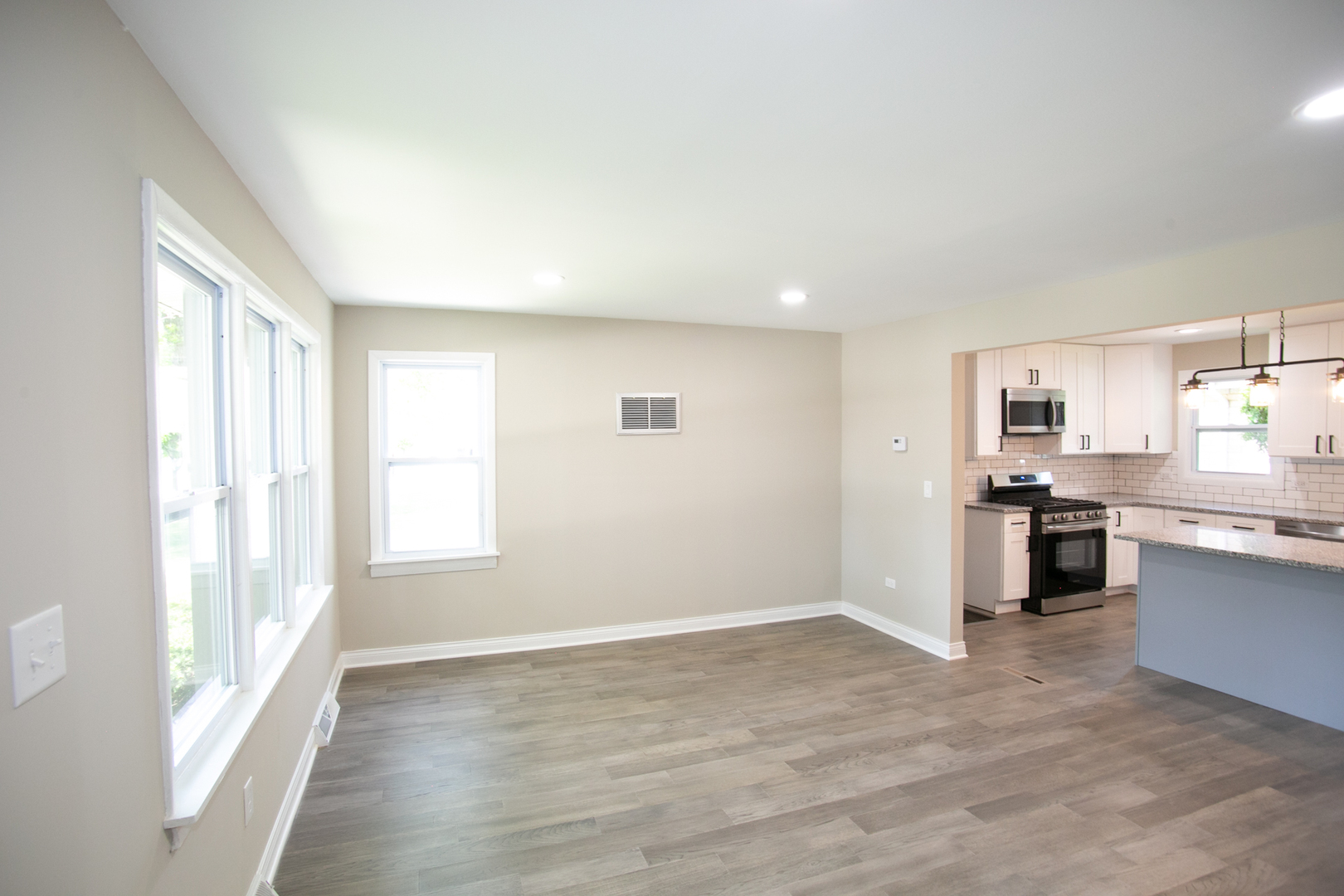 6000 Birmingham Street Chicago Ridge, IL 60415 - Photo 8 of 23 a view of kitchen with wooden floor and electronic appliances