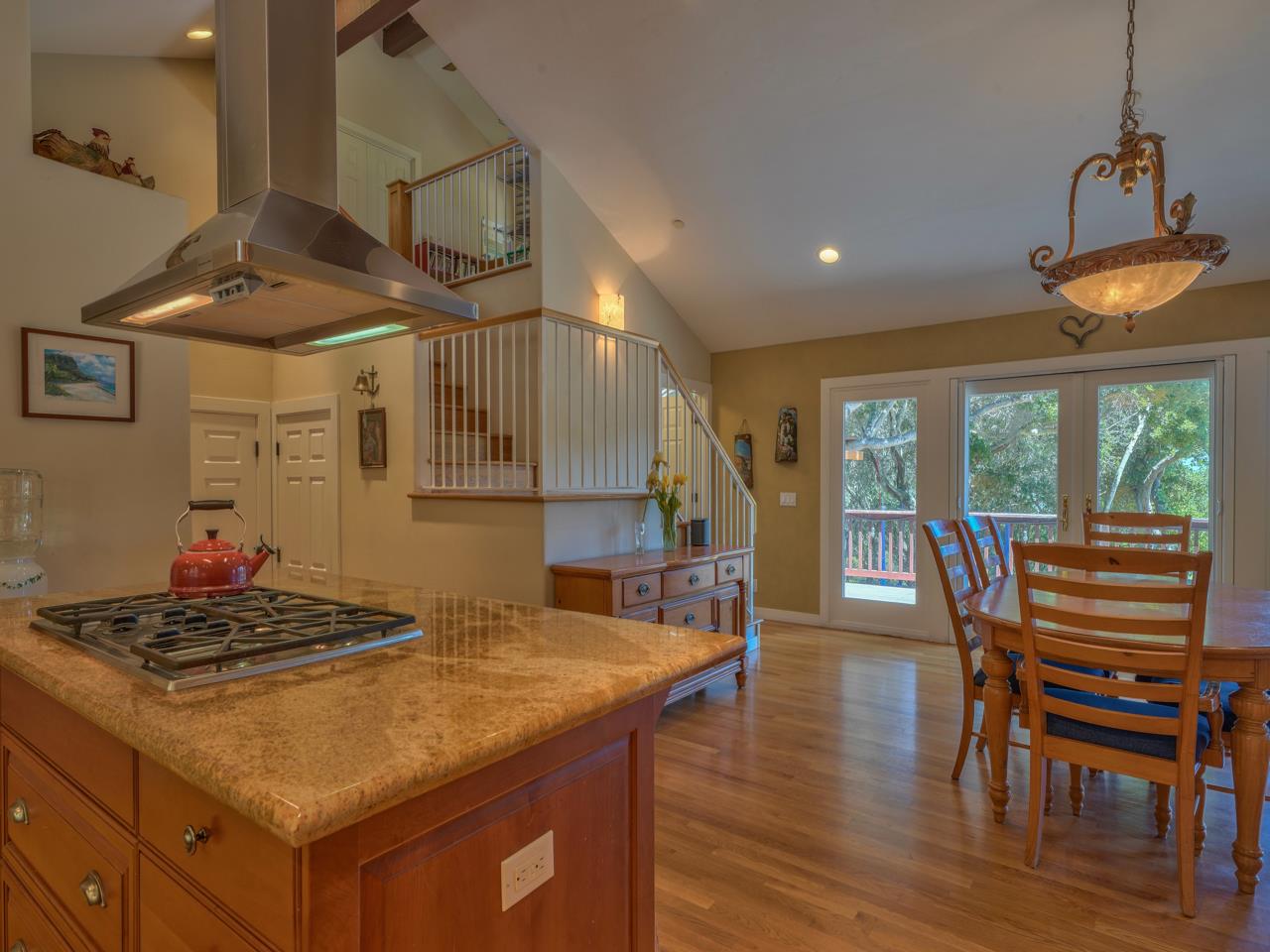 27470 Schulte Road Carmel, CA 93923 - Photo 14 of 56 a kitchen with stainless steel appliances granite countertop a stove and a refrigerator