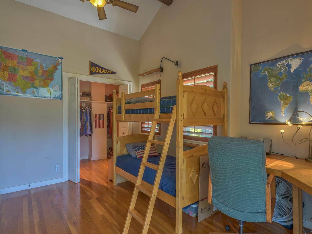 27470 Schulte Road Carmel, CA 93923 - Photo 32 of 56 a living room with furniture and a flat screen tv