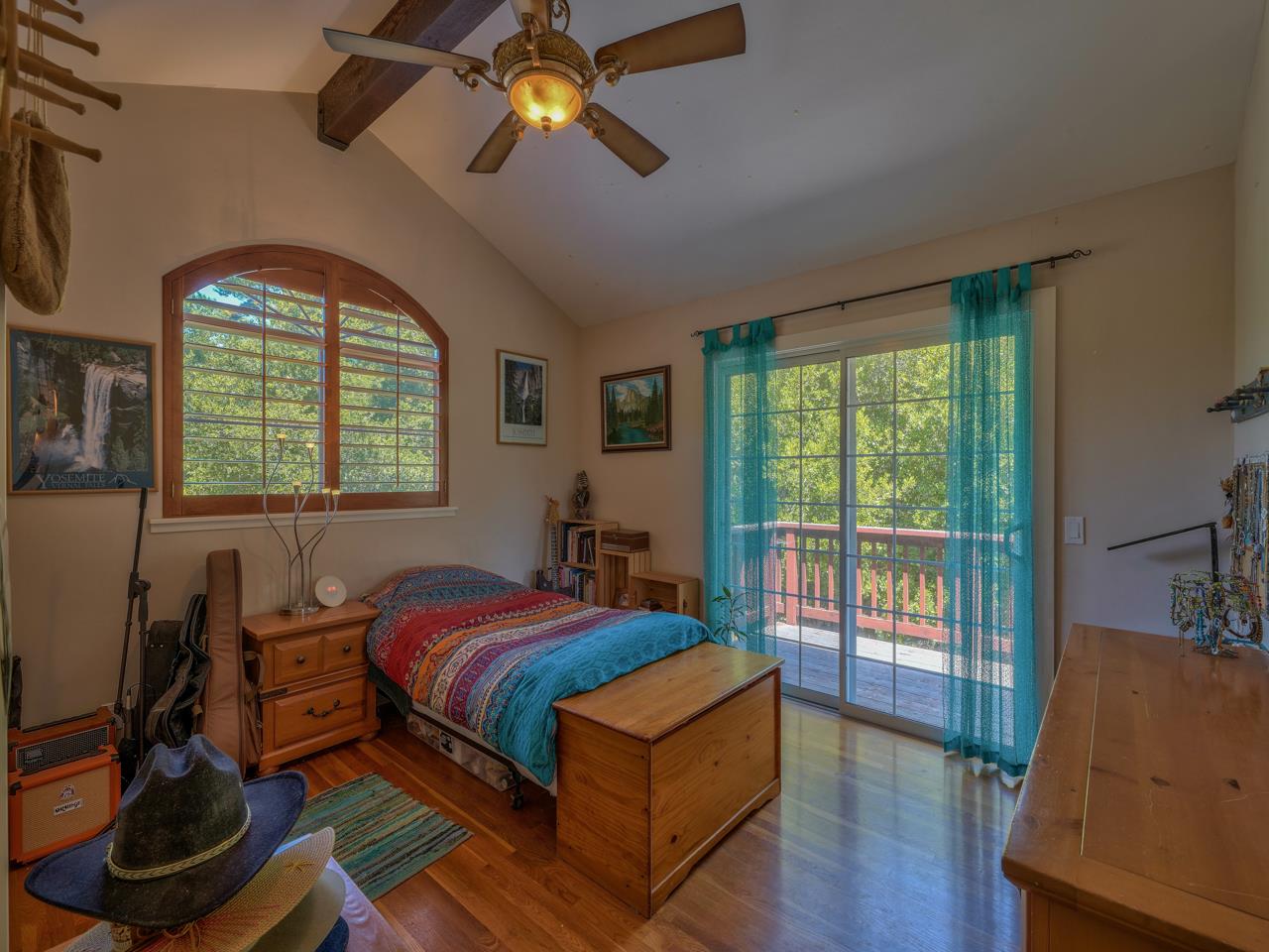 27470 Schulte Road Carmel, CA 93923 - Photo 33 of 56 a blue bed sitting in a bedroom next to a window