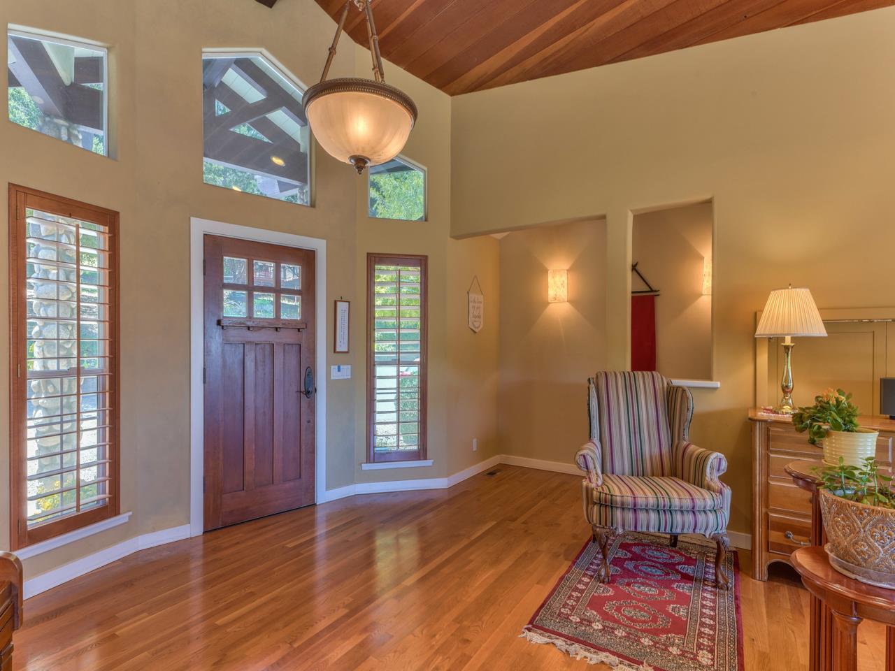 27470 Schulte Road Carmel, CA 93923 - Photo 5 of 56 a view of a livingroom with furniture and windows