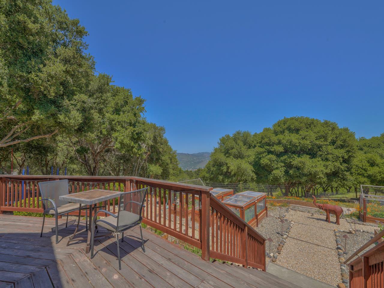 27470 Schulte Road Carmel, CA 93923 - Photo 48 of 56 a balcony with wooden floor and city view