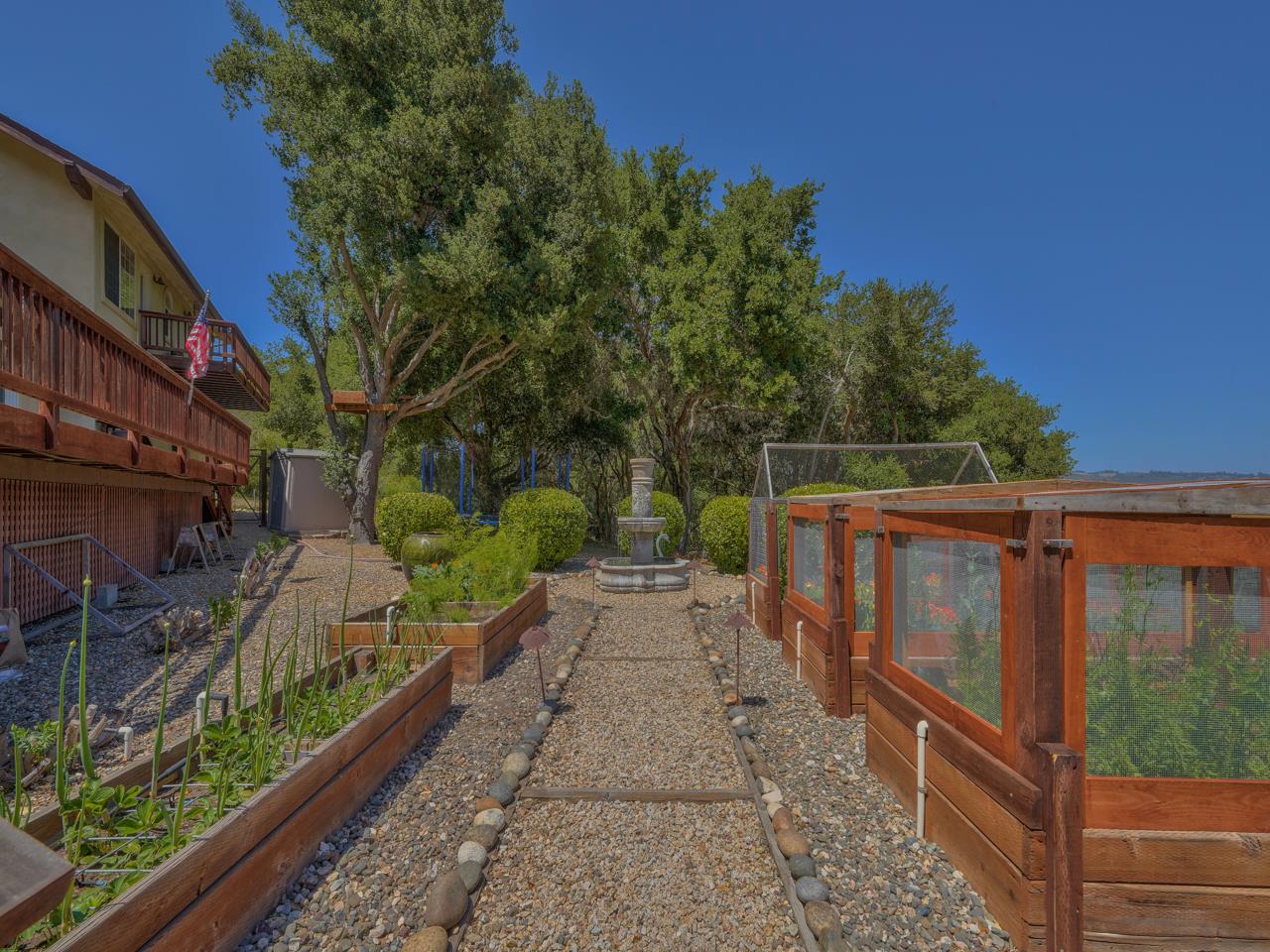 27470 Schulte Road Carmel, CA 93923 - Photo 50 of 56 a view of a pathway with a wrought fence