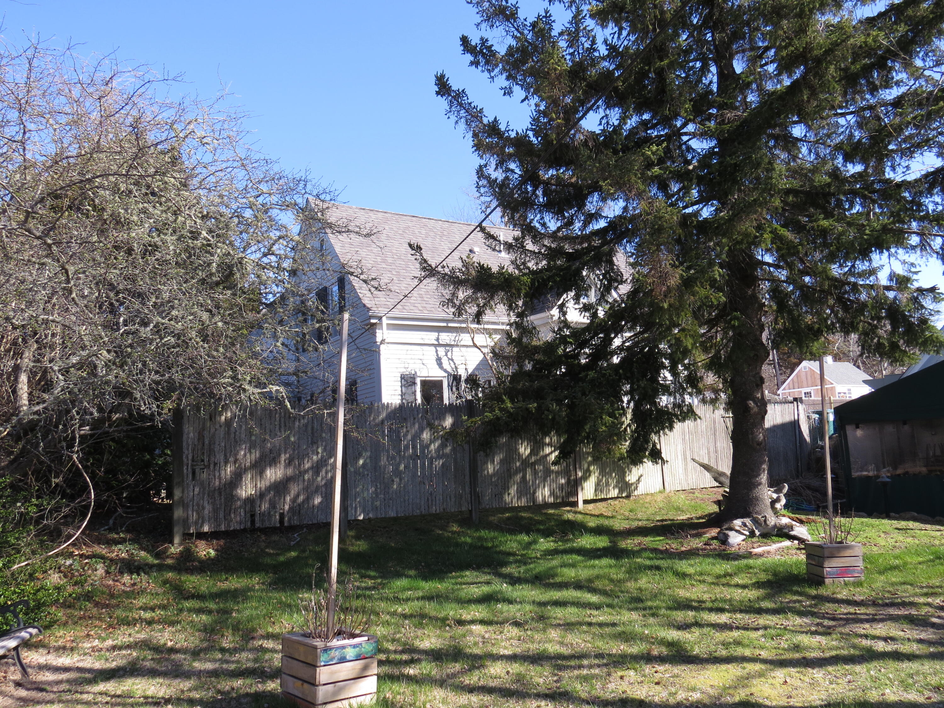 a backyard of a house with lots of green space