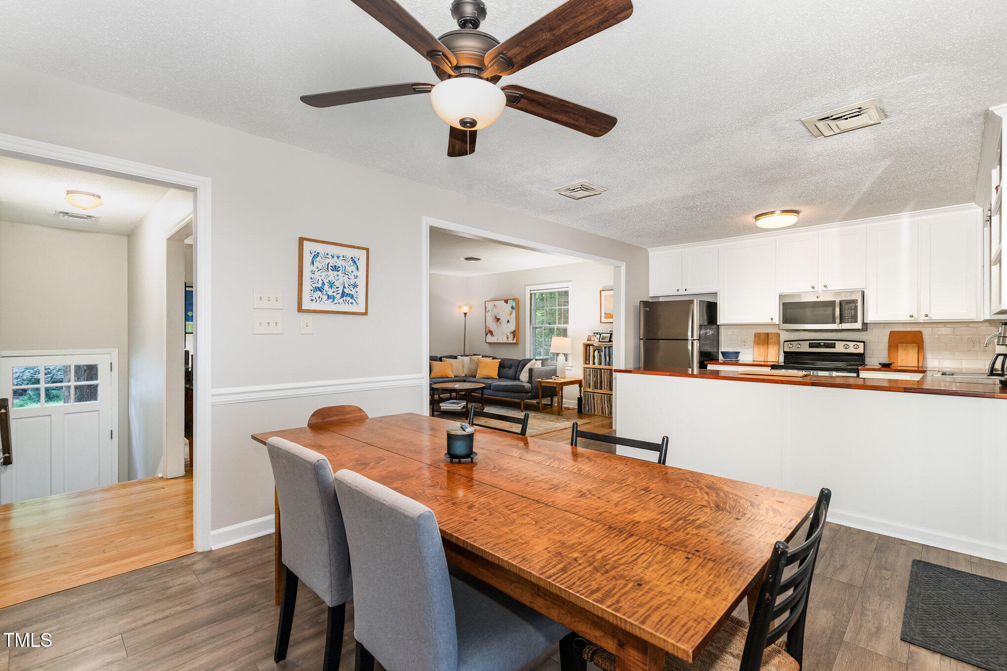 2900 Beechgrove Drive Durham, NC 27705 - Photo 9 of 32 a dining room with furniture and window