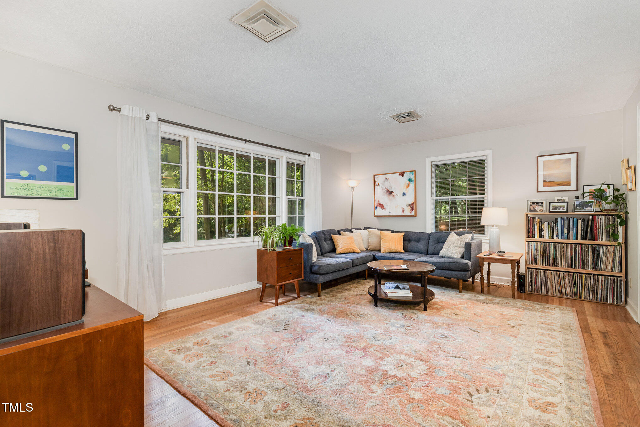 2900 Beechgrove Drive Durham, NC 27705 - Photo 2 of 32 a living room with furniture window and wooden floor