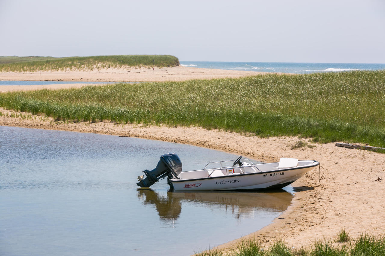 50 Oyster Watcha Road Edgartown, MA 02539 - Photo 16 of 27 a view of a lake with a mountain