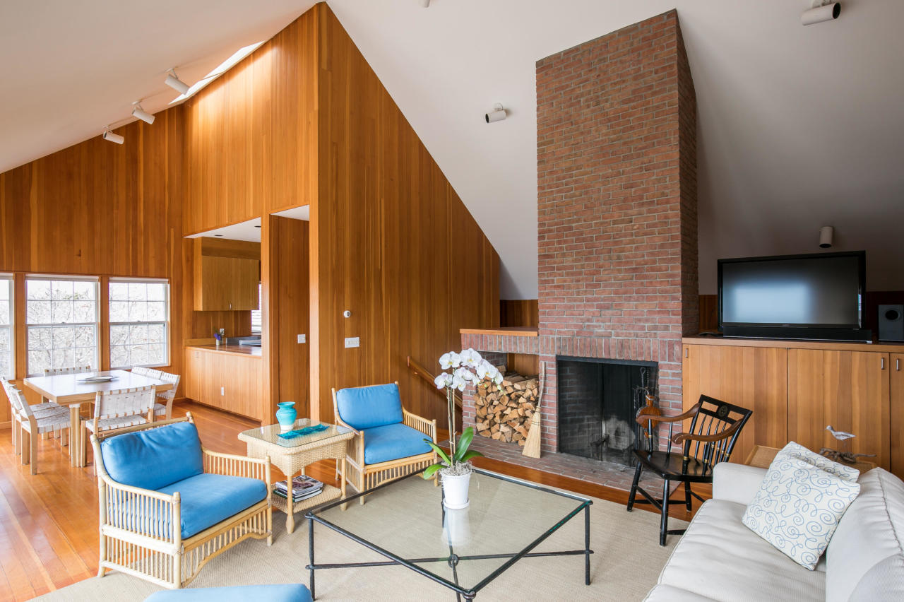 50 Oyster Watcha Road Edgartown, MA 02539 - Photo 21 of 27 a living room with furniture and a fireplace