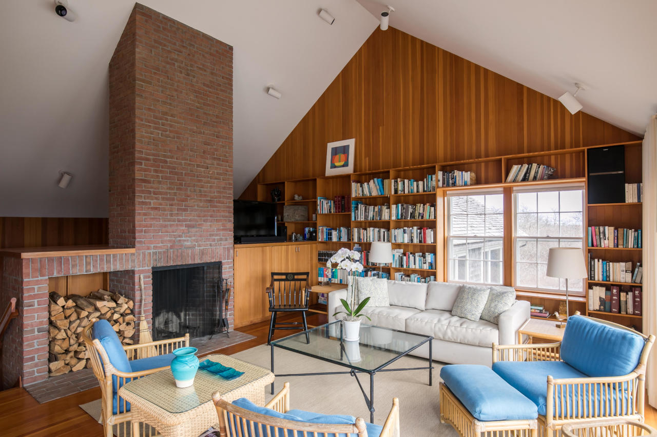 50 Oyster Watcha Road Edgartown, MA 02539 - Photo 23 of 27 a living room with furniture a fireplace and a large window