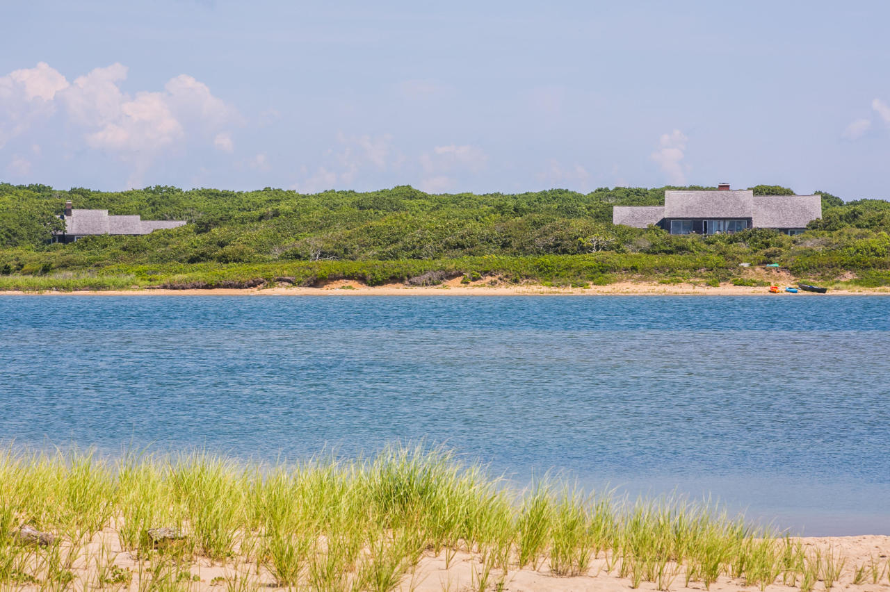 50 Oyster Watcha Road Edgartown, MA 02539 - Photo 4 of 27 a view of a city and an ocean beach