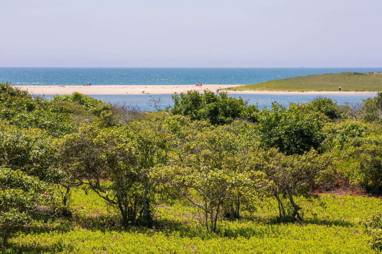 50 Oyster Watcha Road Edgartown, MA 02539 - Photo 10 of 27 a view of a lake with a beach