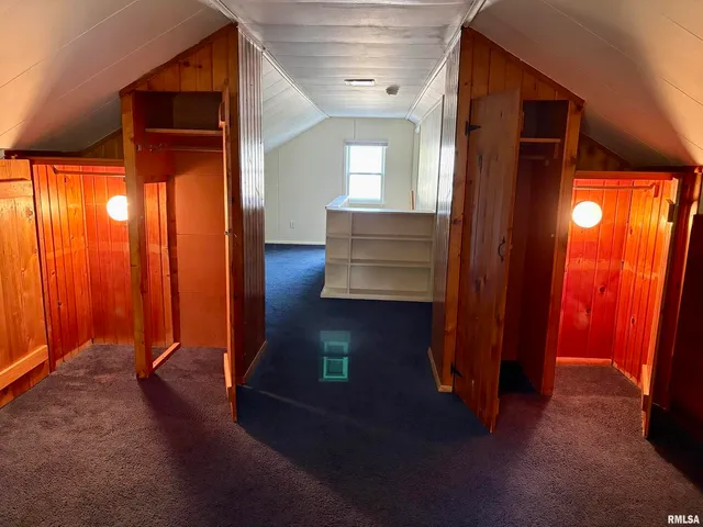a view of front door with wooden floor