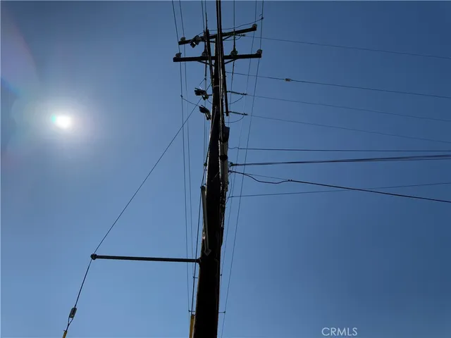 a view of storage and utility room with projector and washer