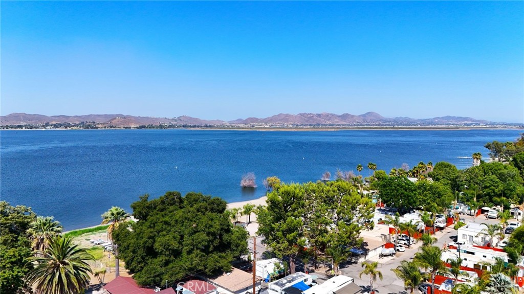 0 Garner Road Lake Elsinore, CA 92530 - Photo 2 of 13 a view of a lake with a mountain in the background
