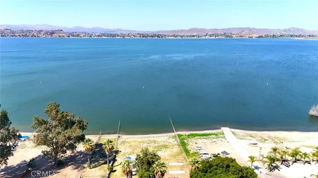a view of an ocean and a mountain