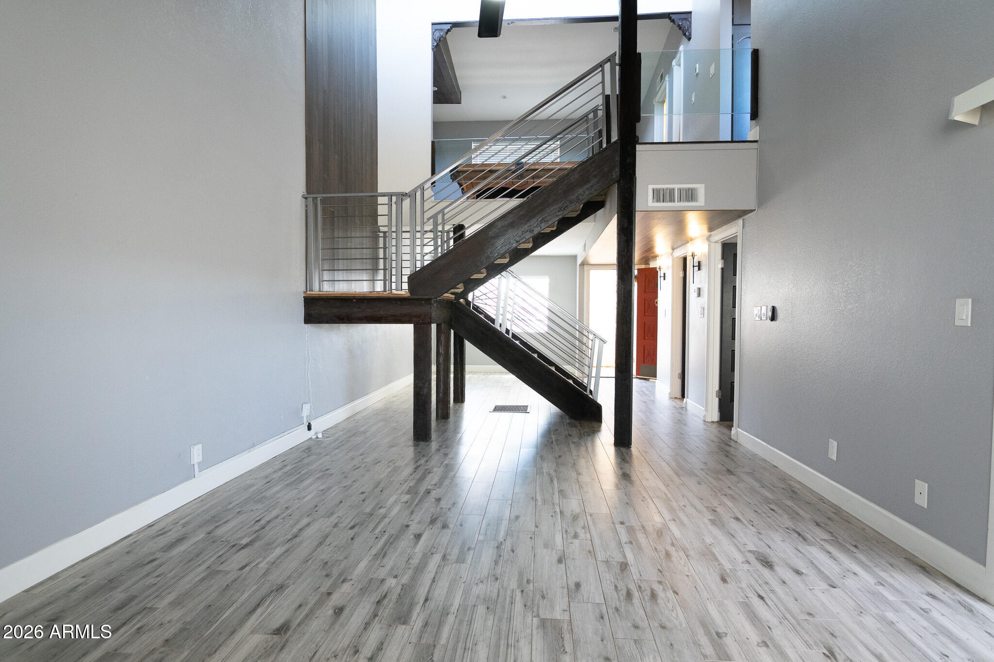 5100 North Miller Road, Unit 3 Scottsdale, AZ 85250 - Photo 4 of 31 a view of entryway and hall with wooden floor
