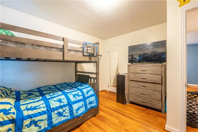 a bedroom with a bed and furniture