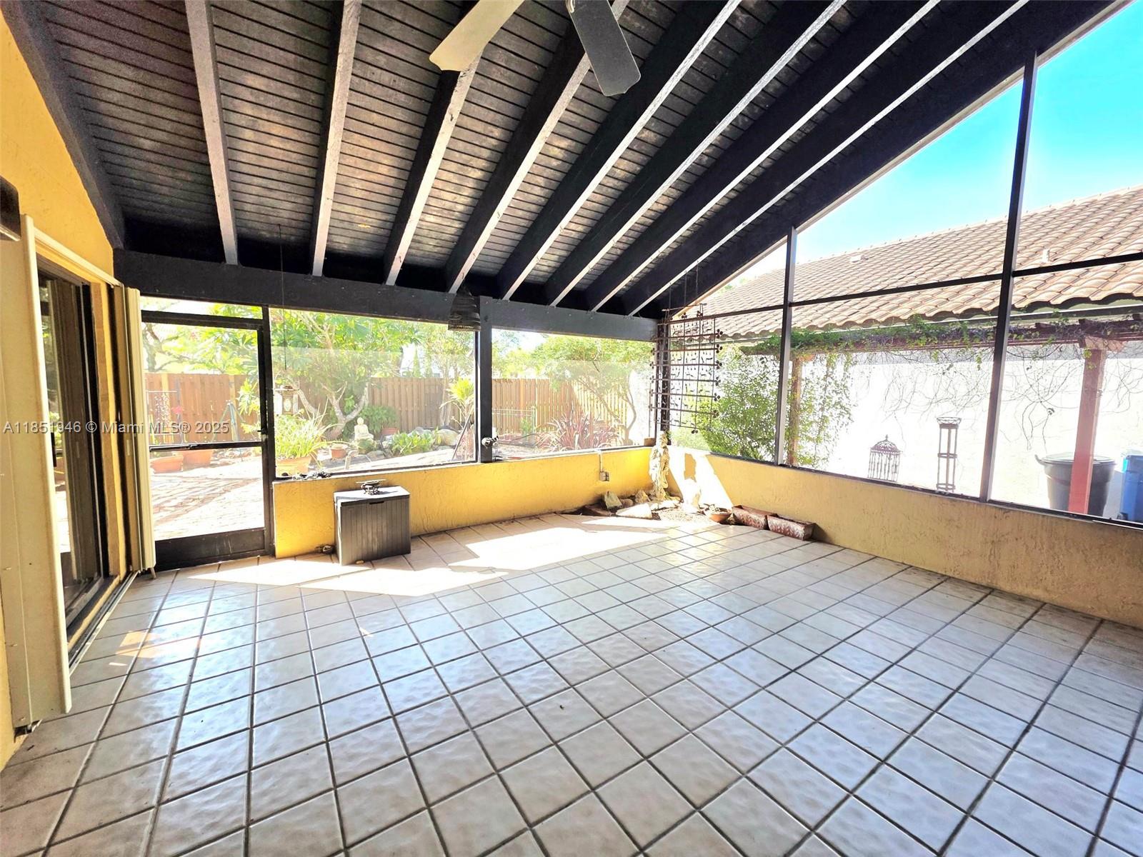 2320 Dover, Unit 2320 Weston, FL 33326 - Photo 16 of 44 a view of an empty room with a window