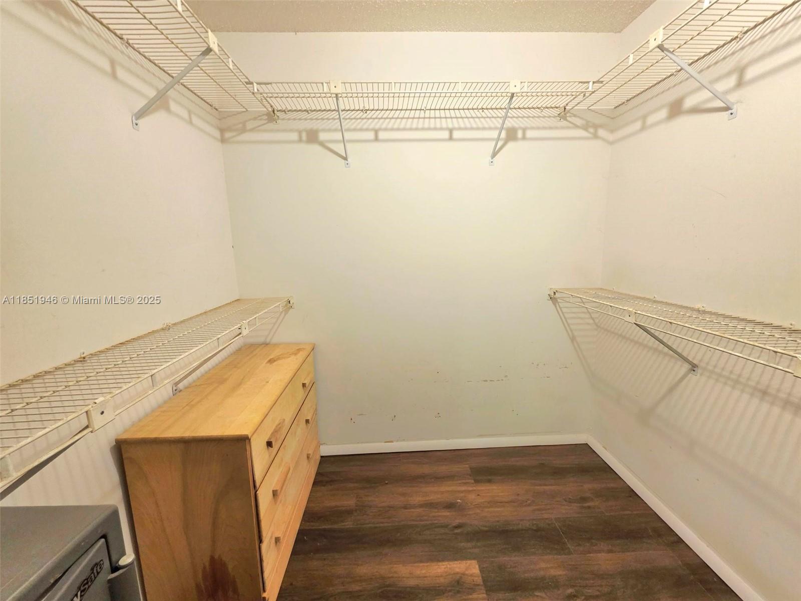 2320 Dover, Unit 2320 Weston, FL 33326 - Photo 31 of 44 a view of a room with racks on the wall