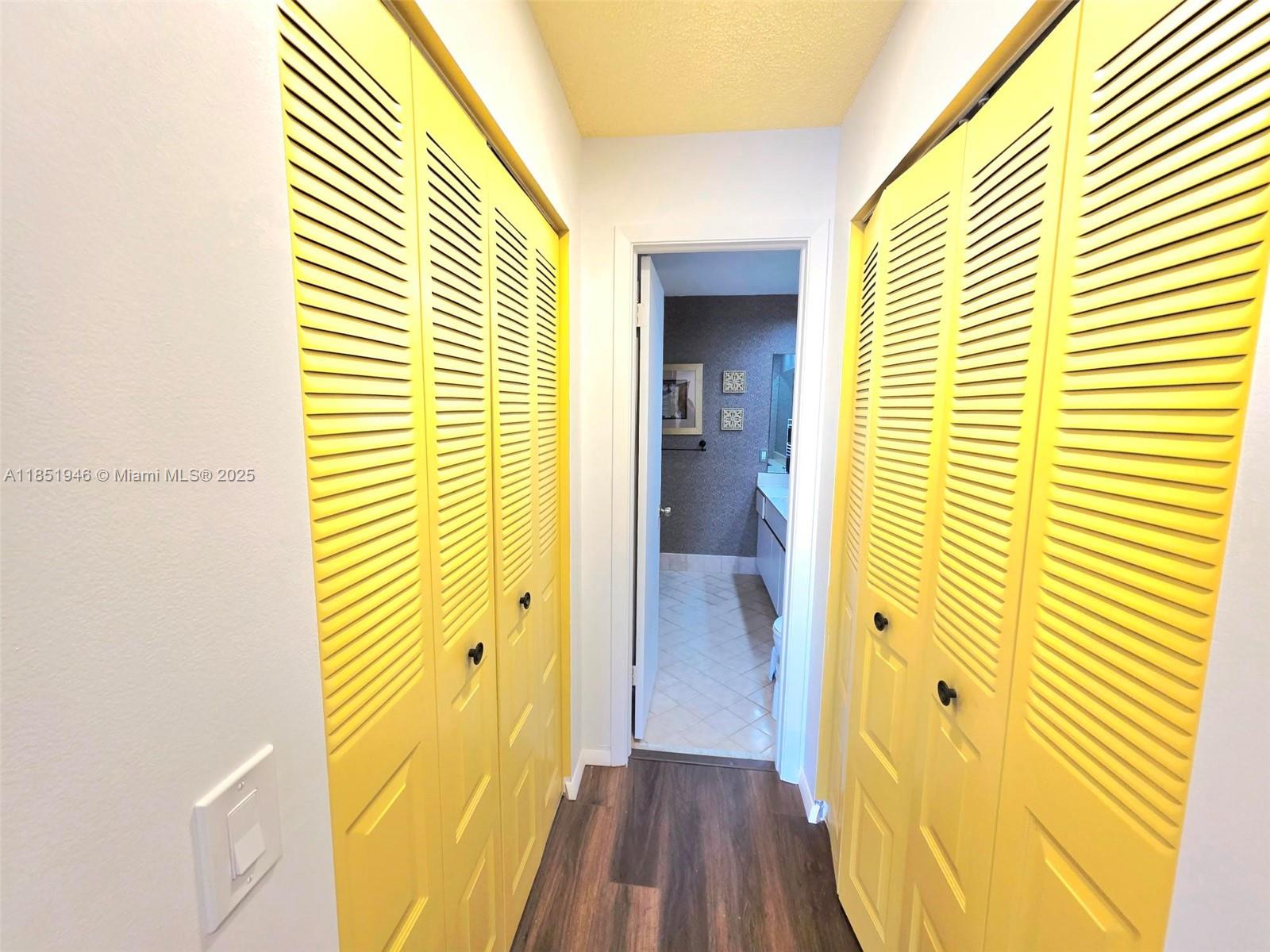 2320 Dover, Unit 2320 Weston, FL 33326 - Photo 36 of 44 wooden view of a hallway with wooden floor