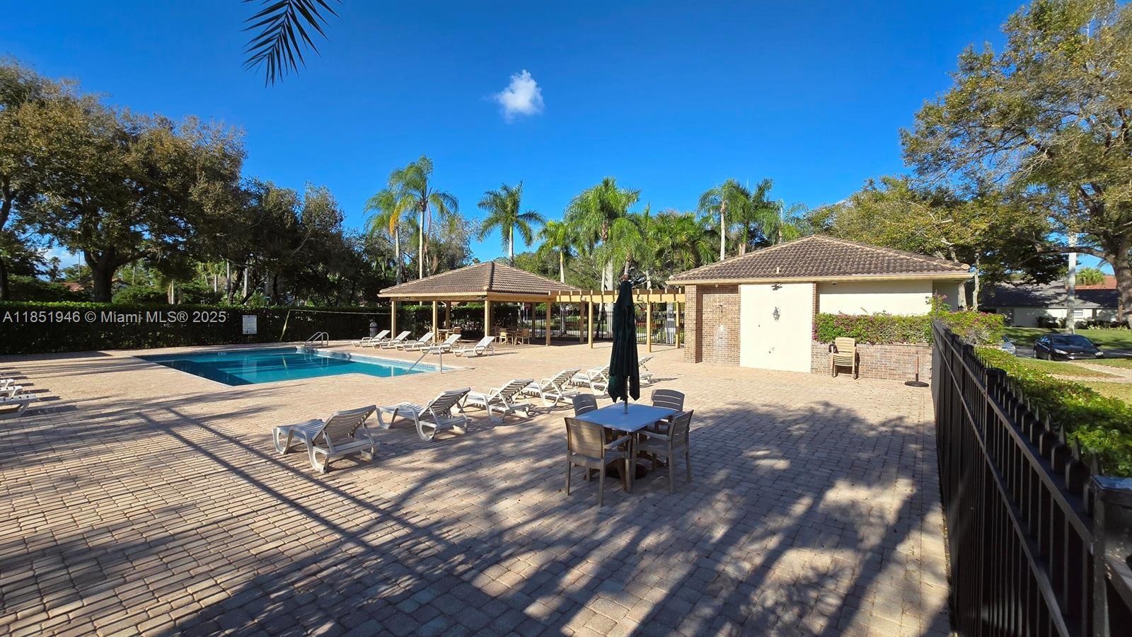 2320 Dover, Unit 2320 Weston, FL 33326 - Photo 41 of 44 a front view of a house with garden