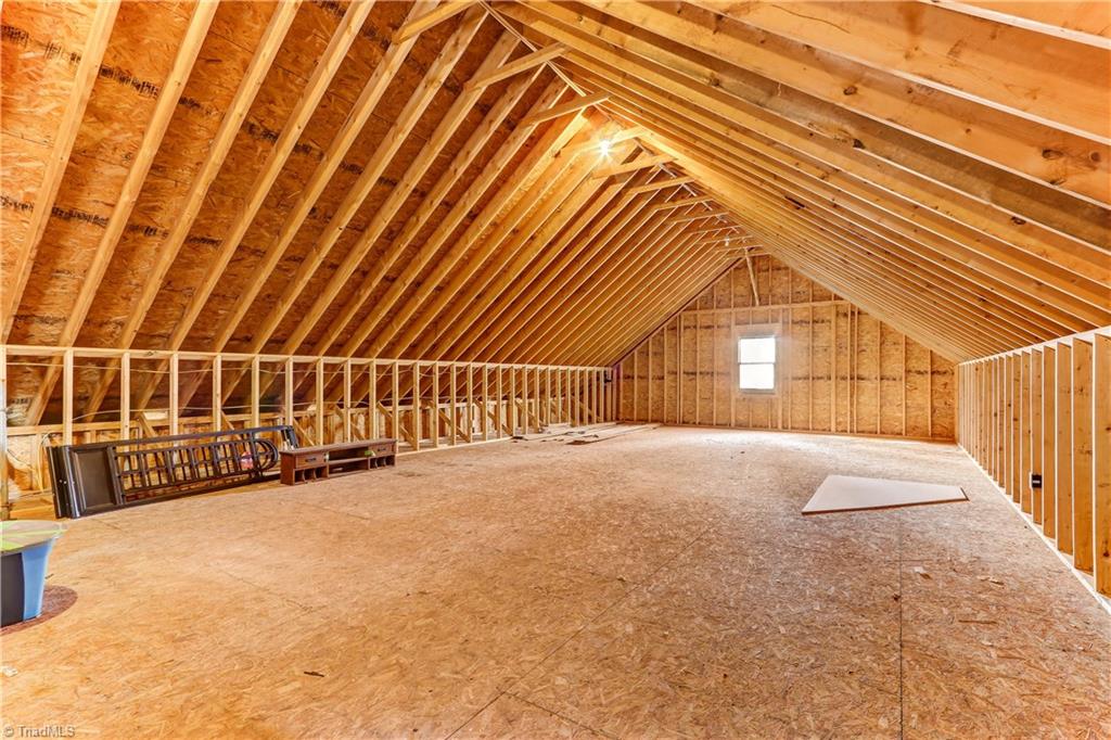 8605 Tuttle Ridge Road Germanton, NC 27019 - Photo 17 of 30 There is over 1,000 feet of walk-up, floored storage space above the garage. WOW!