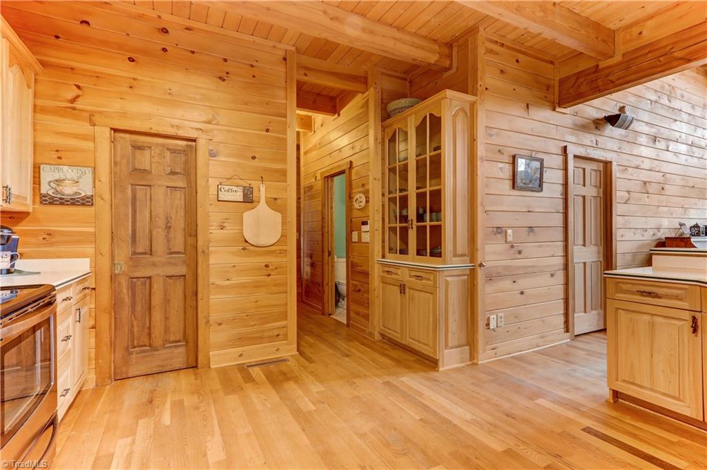 8605 Tuttle Ridge Road Germanton, NC 27019 - Photo 6 of 30 A built in china hutch provides extra storage. The laundry room and access to the garage are just down the hall. The perfect place to drop off your boots after spending the day outside!