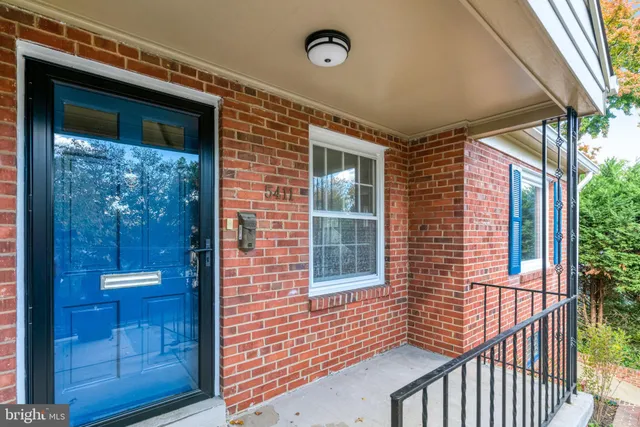 a view of a door and a window