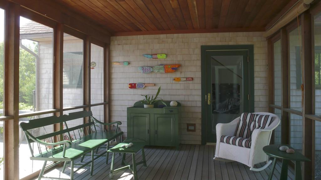 578 Newbury Neck Road Surry, ME 04684 - Photo 24 of 26 Screened/Glassed in porch that joins...