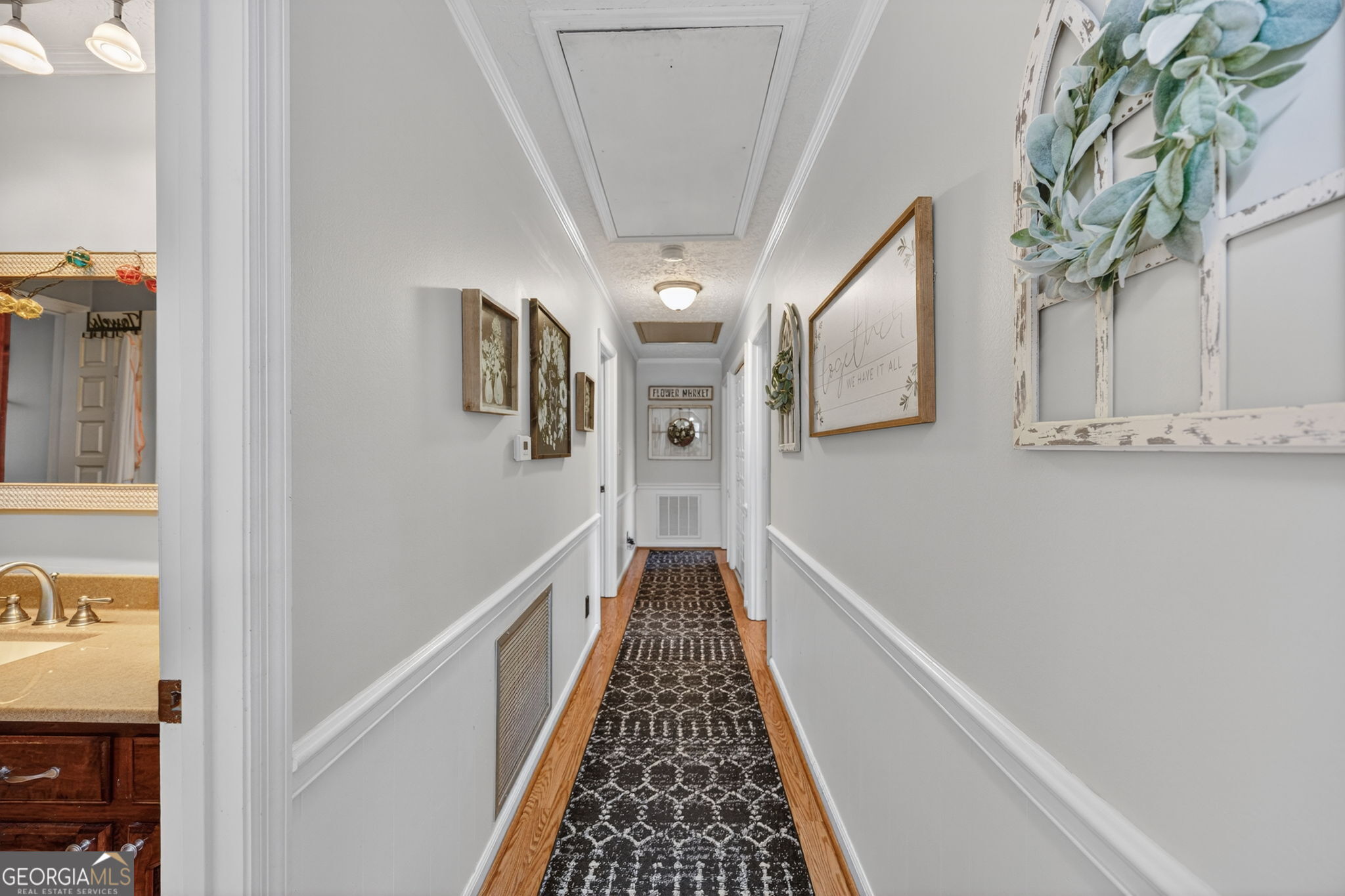 119 Old Town Road Gray, GA 31032 - Photo 13 of 39 a view of a hallway with wooden floor and staircase
