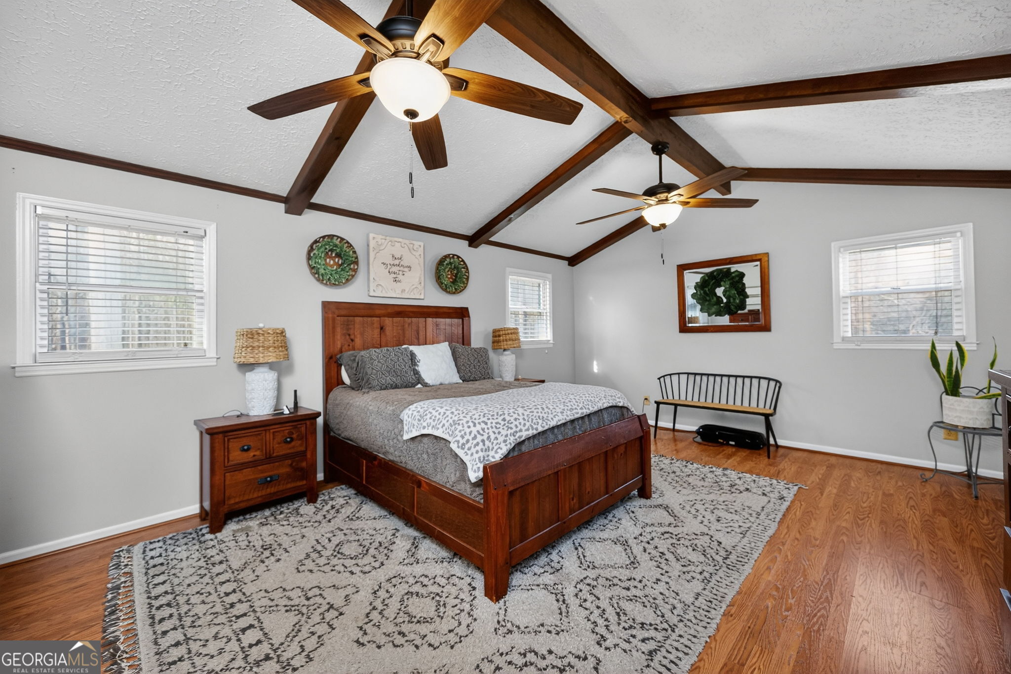 119 Old Town Road Gray, GA 31032 - Photo 14 of 39 a bedroom with a bed and a dresser next to a window