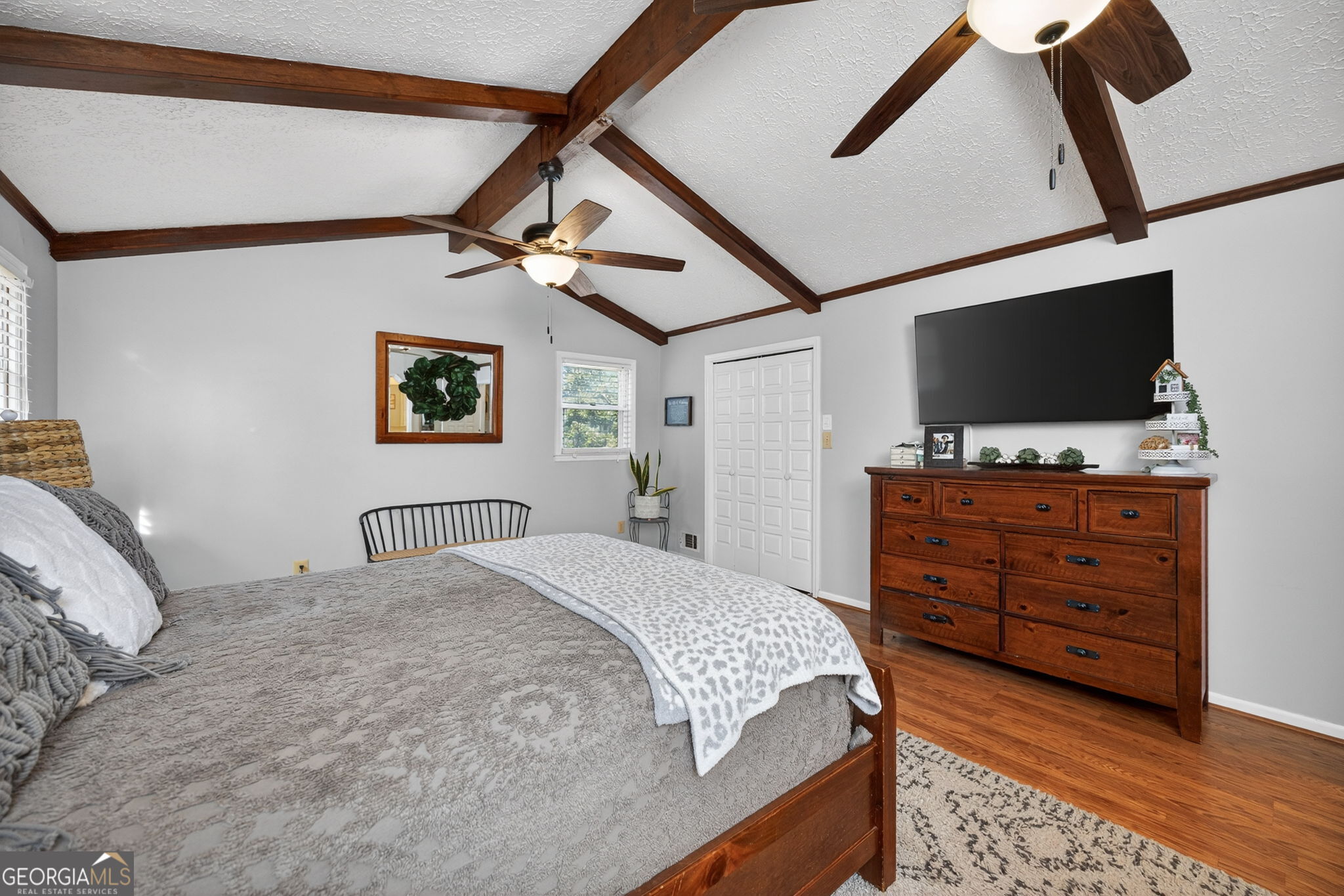 119 Old Town Road Gray, GA 31032 - Photo 15 of 39 a bedroom with a bed and a flat screen tv