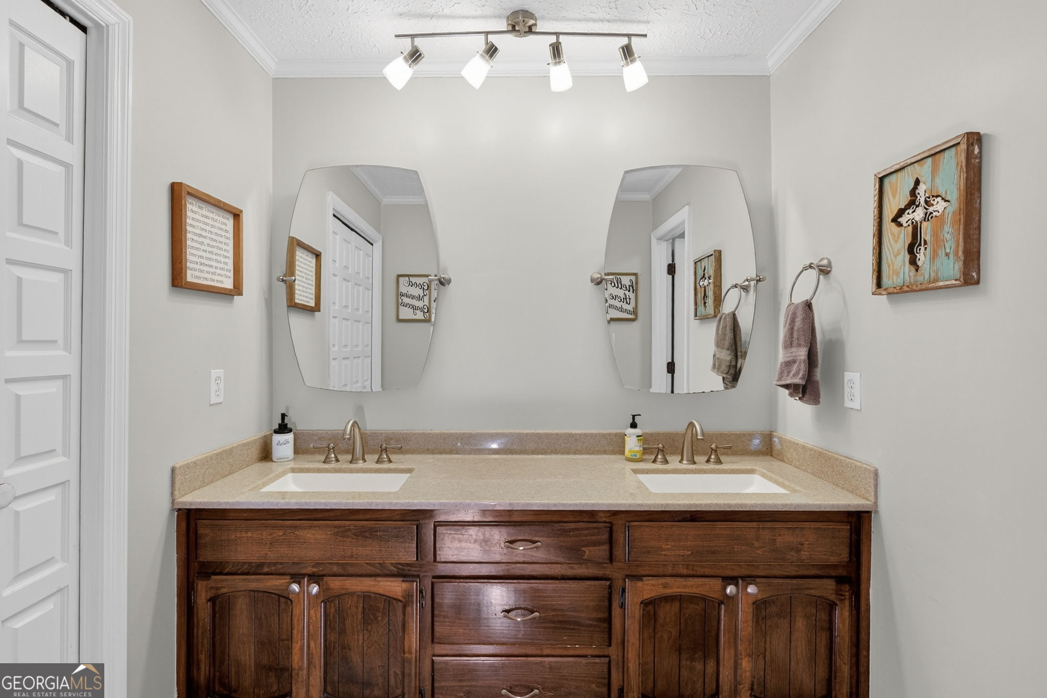119 Old Town Road Gray, GA 31032 - Photo 17 of 39 a bathroom with double vanity sinks and a mirror