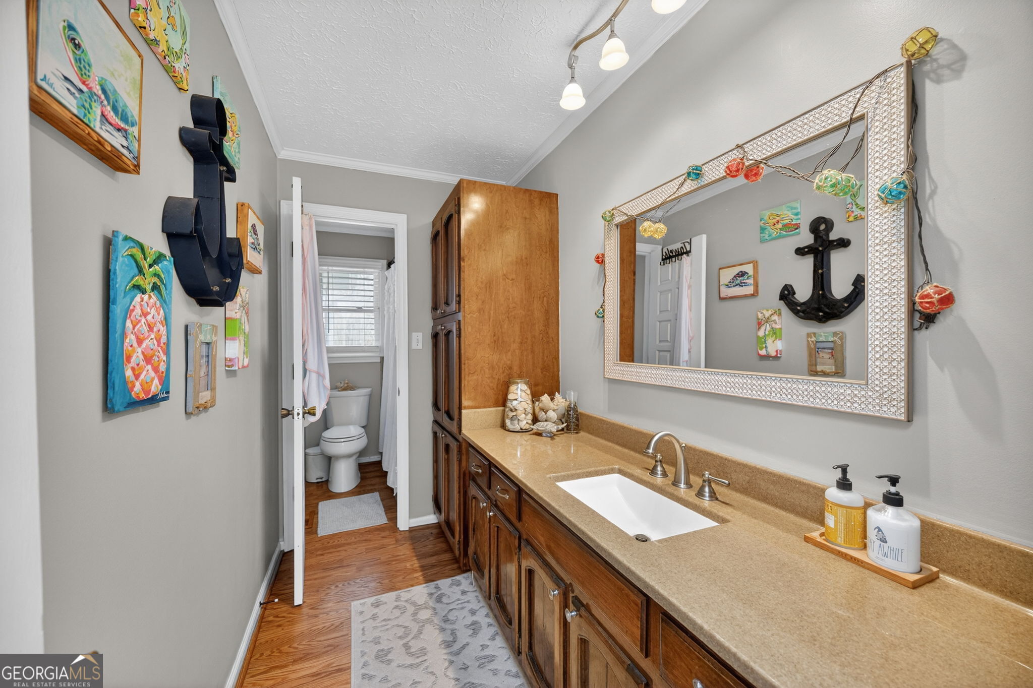 119 Old Town Road Gray, GA 31032 - Photo 20 of 39 a bathroom with a sink a vanity and a mirror