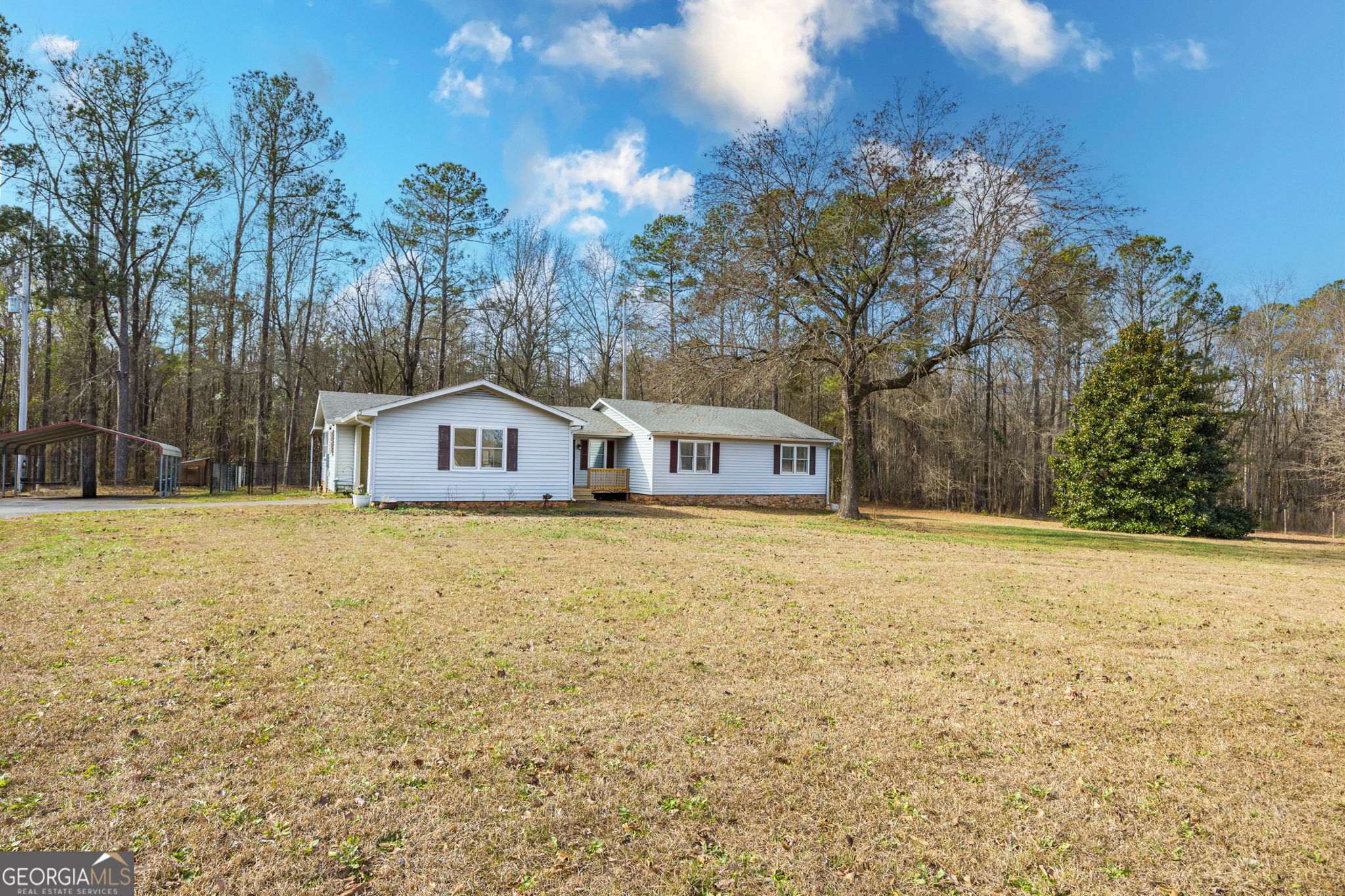 119 Old Town Road Gray, GA 31032 - Photo 35 of 39 a house with tall trees in the background