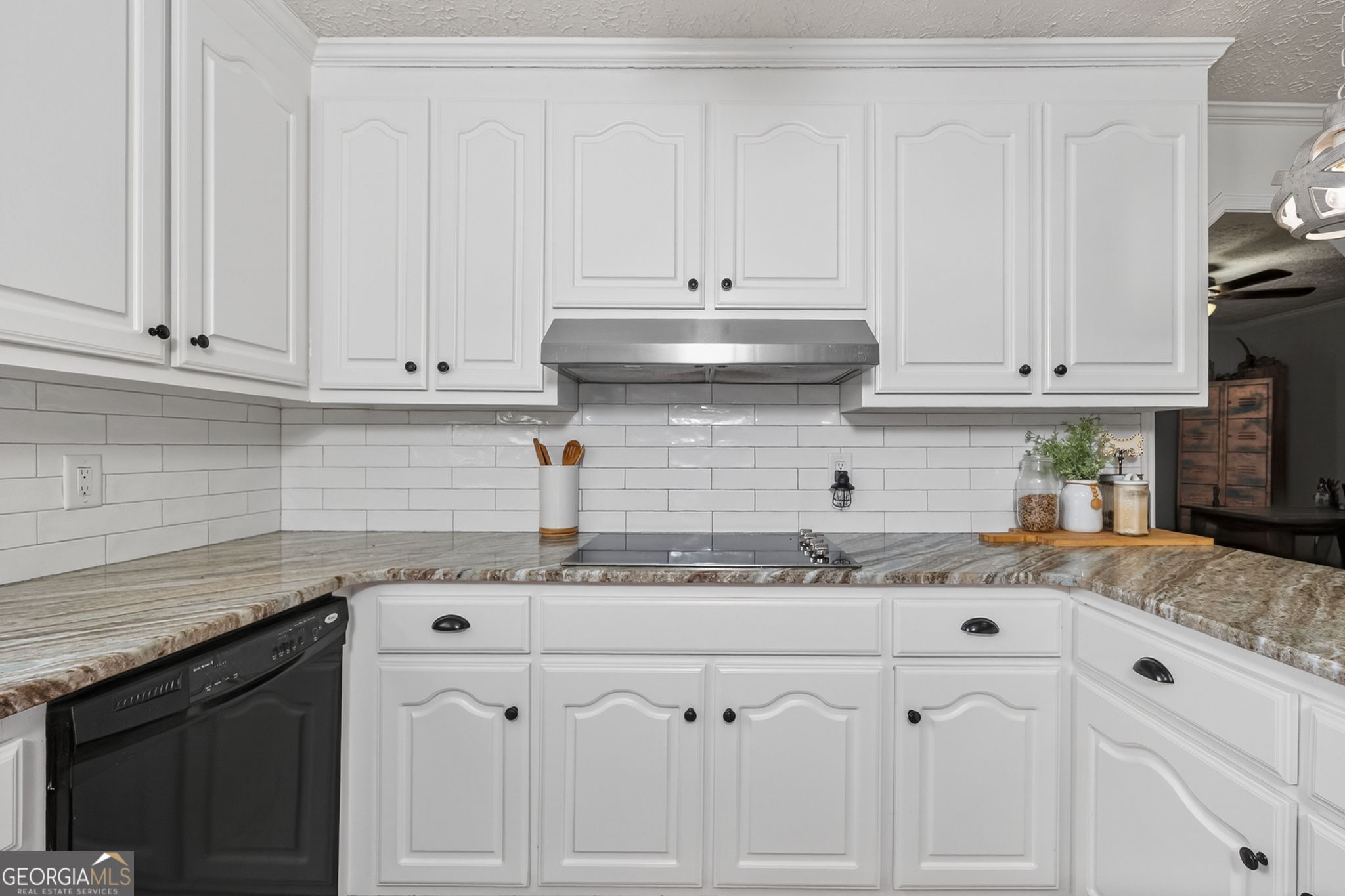 119 Old Town Road Gray, GA 31032 - Photo 9 of 39 a kitchen with granite countertop white cabinets and sink