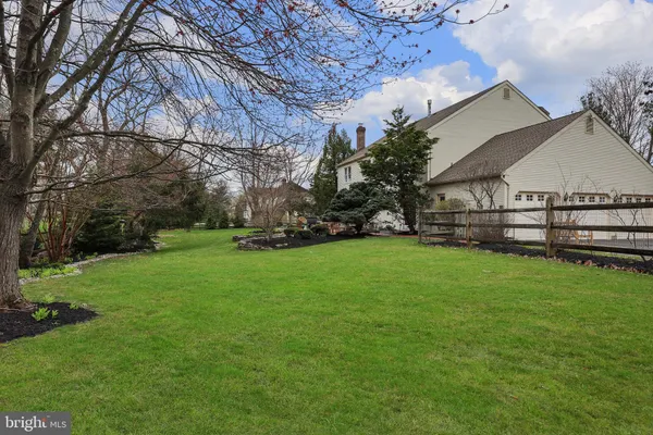 a view of a house with a back yard