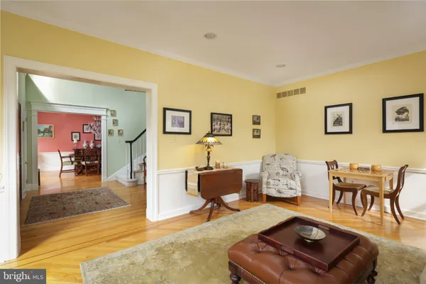 a living room with furniture and a rug