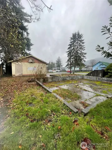 a view of a swimming pool with an outdoor space and seating area