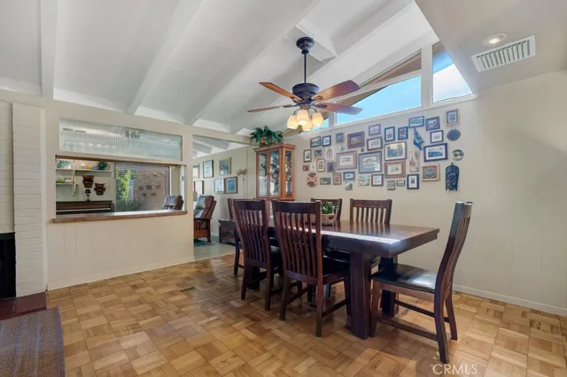 a view of a dining room with furniture