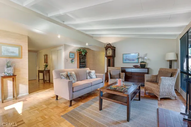 a living room with furniture and a table