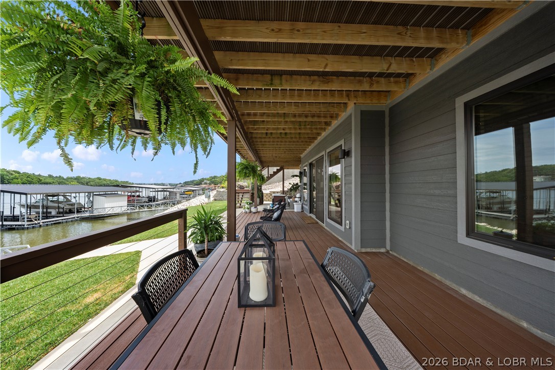 1151 Oak Road Osage Beach, MO 65065 - Photo 49 of 63 Relaxing covered deck with peaceful waterfront vie