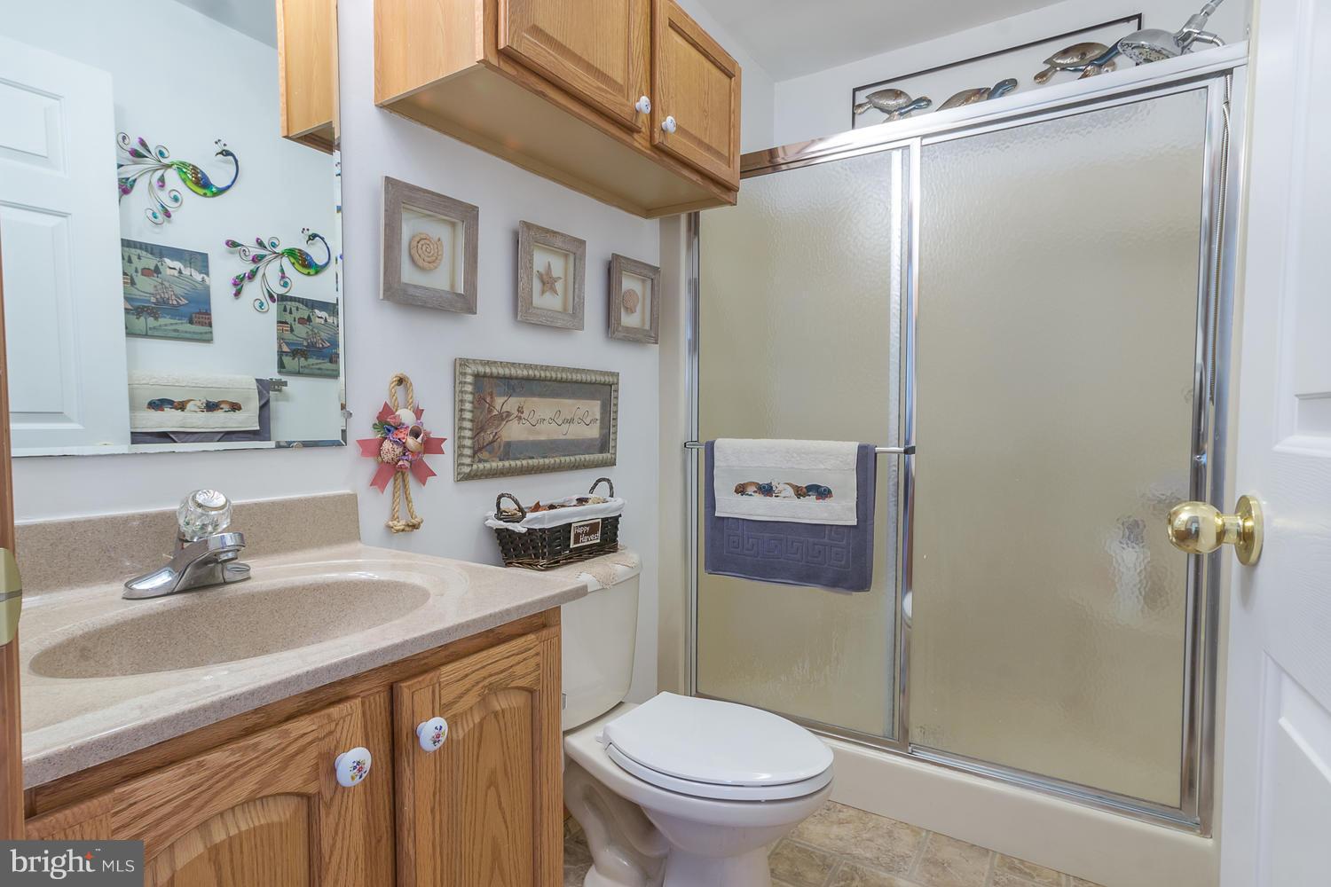 3610 Galloway Road Baltimore, MD 21220 - Photo 16 of 30 Main Lvl Hall Bath w/Walk-In Shower, Oak Cabinets