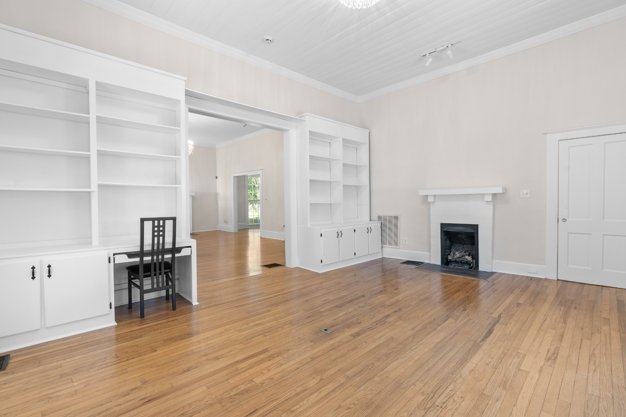 219 Old Mill Road Winchester, TN 37398 - Photo 11 of 23 a view of empty room with wooden floor and fireplace