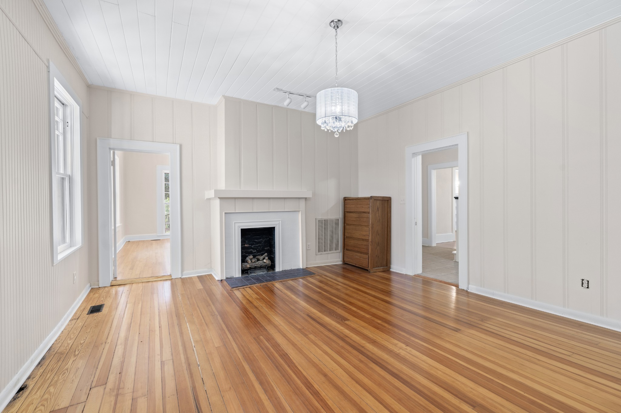 219 Old Mill Road Winchester, TN 37398 - Photo 12 of 23 a view of a livingroom with wooden floor and a ceiling fan