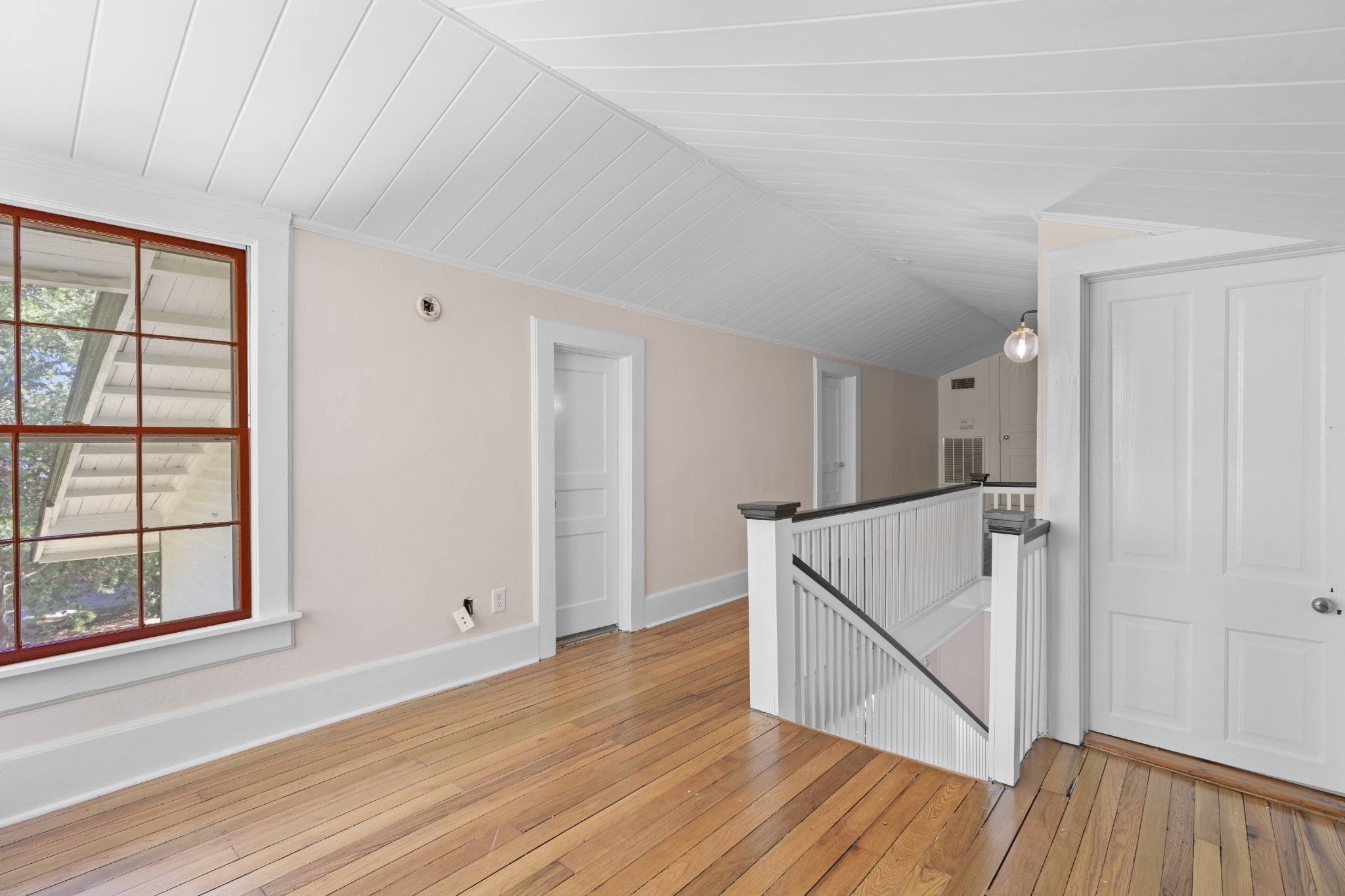 219 Old Mill Road Winchester, TN 37398 - Photo 20 of 23 an empty room with wooden floor and windows