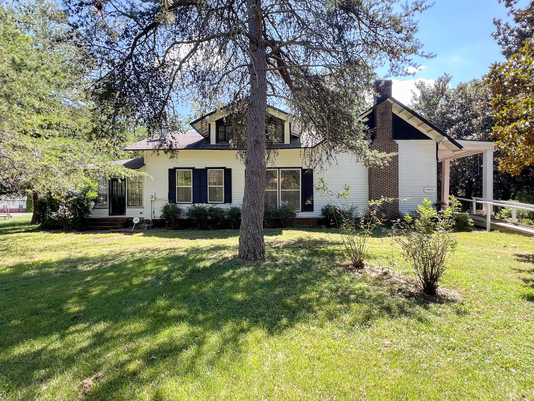 219 Old Mill Road Winchester, TN 37398 - Photo 5 of 23 a front view of house with yard and trees in the background