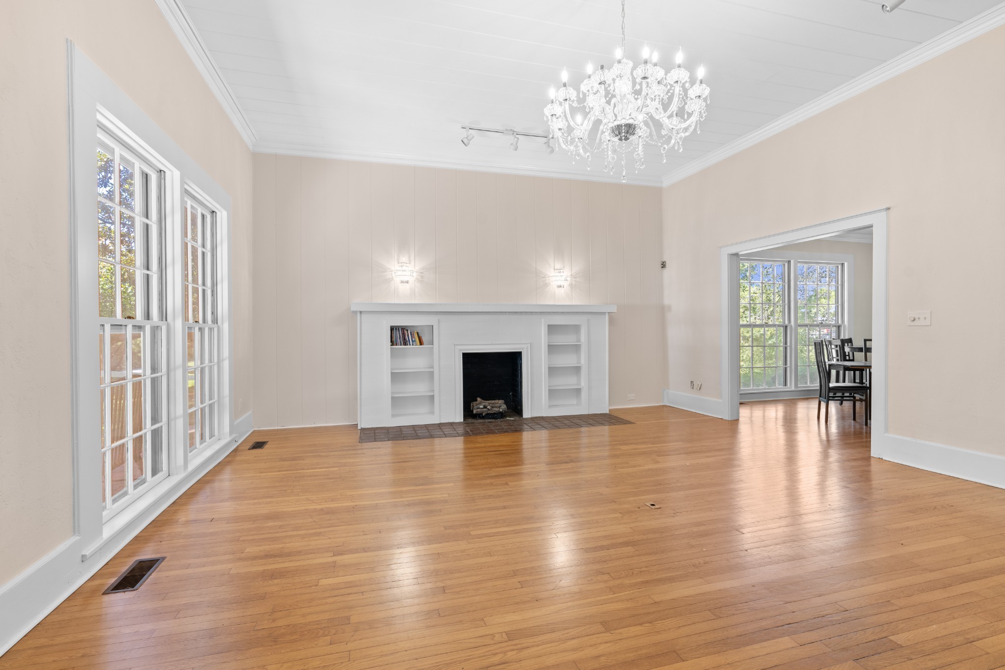 219 Old Mill Road Winchester, TN 37398 - Photo 7 of 23 a view of empty room with wooden floor and fireplace
